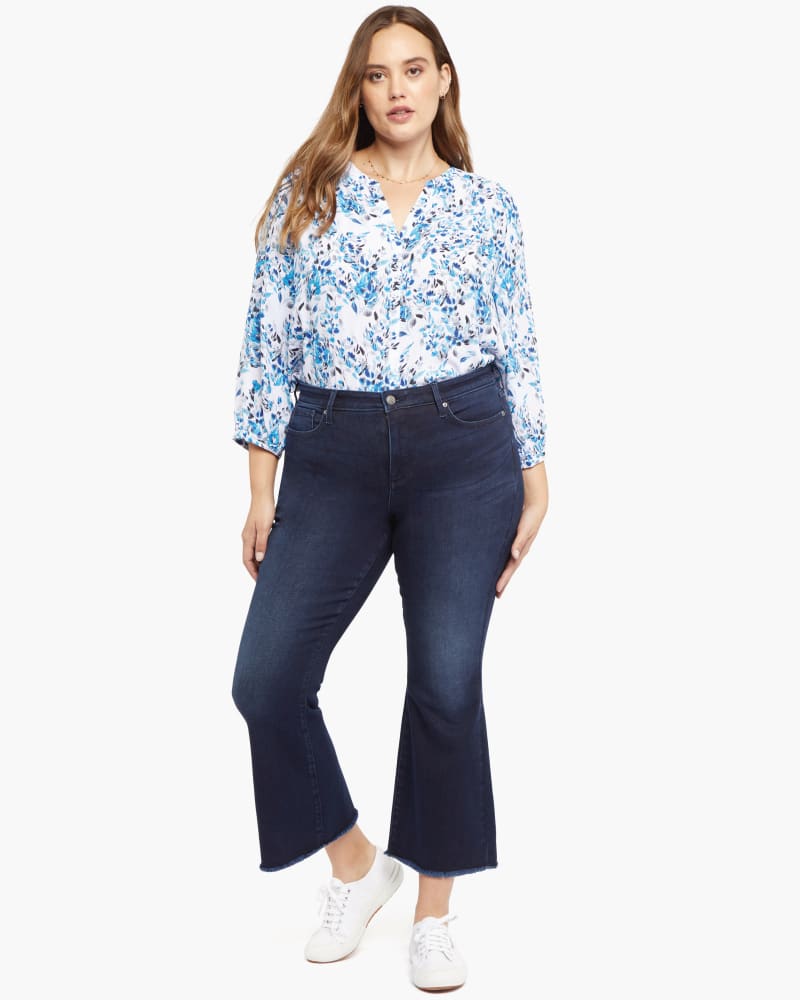 Front of a model wearing a size 14 Ava Fray Hem Ankle Jean in Rapture by NYDJ. | dia_product_style_image_id:170710